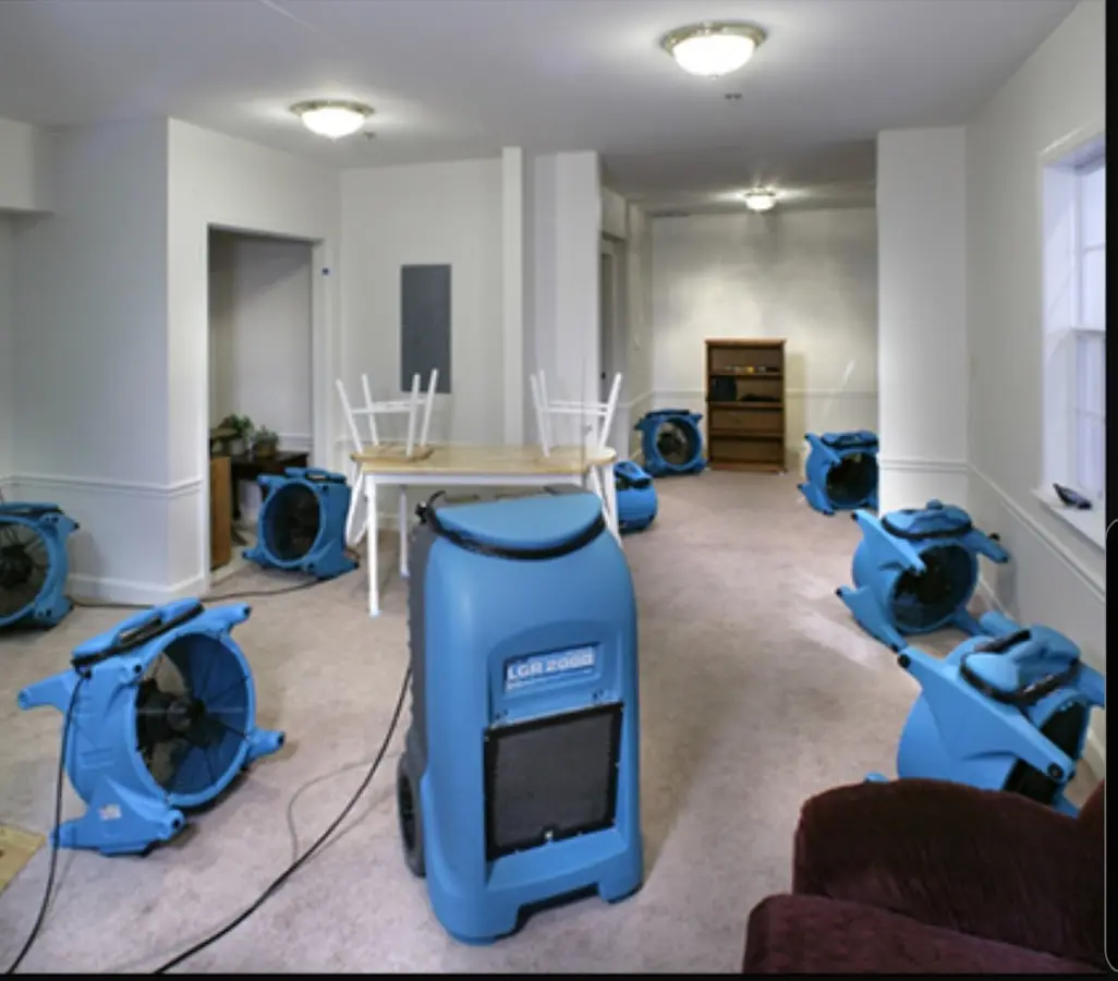 Air movers and dehumidifier setup for Water Damage Restoration in Wrentham
